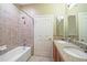 Bathroom with double sinks and shower/tub combo at 25554 Prada Dr, Punta Gorda, FL 33955