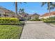 Spacious driveway leading to a beautiful waterfront home at 2863 Mill Creek Rd, Port Charlotte, FL 33953