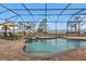 Inviting pool and spa with screened enclosure and water views at 2863 Mill Creek Rd, Port Charlotte, FL 33953