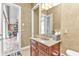 Convenient powder room with granite vanity and access to patio at 2863 Mill Creek Rd, Port Charlotte, FL 33953