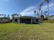 House with large backyard and screened porch at 3672 Vehlin St, North Port, FL 34286