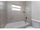 Simple bathroom with a bathtub and shower at 3672 Vehlin St, North Port, FL 34286