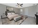 Main bedroom with ensuite bathroom and ceiling fan at 3672 Vehlin St, North Port, FL 34286