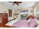 Main bedroom with private access to the patio and golf course view at 3818 Bordeaux Dr, Punta Gorda, FL 33950