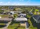 Wide aerial view showing the home's neighborhood and surrounding houses at 429 W Ann St, Punta Gorda, FL 33950