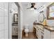 Bright bathroom with granite vanity and modern fixtures at 429 W Ann St, Punta Gorda, FL 33950