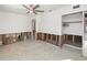 Unfinished bedroom with closet, new flooring and ceiling fan at 429 W Ann St, Punta Gorda, FL 33950