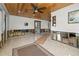 Open living area with wood ceilings and large windows at 429 W Ann St, Punta Gorda, FL 33950