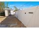 White storage shed with gate and gravel pathway at 429 W Ann St, Punta Gorda, FL 33950