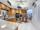 Kitchen with granite countertops and stainless steel appliances at 4365 Aladdin Ave, North Port, FL 34287