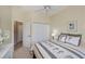 Bedroom with a queen bed, double door closet and access to bathroom at 1013 Live Oak Cir # 13, Port Charlotte, FL 33948