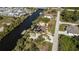 Aerial view of property showing location on canal with neighboring homes at 10361 Redondo St, Port Charlotte, FL 33981