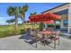 Enjoy a meal at this outdoor patio with umbrella seating at 14617 Sycamore Ct # 2222, Punta Gorda, FL 33955