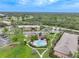 Aerial view of condo community with pool and parking at 1515 Forrest Nelson Blvd # D207, Port Charlotte, FL 33952