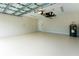 Spacious garage featuring high ceilings and extra storage at 1548 El Paso Ave, North Port, FL 34286