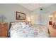 Bedroom with king-size bed and coastal decor at 17094 Acapulco Rd # 313, Punta Gorda, FL 33955