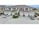 Two-story building with attached garages and landscaping at 17094 Acapulco Rd # 313, Punta Gorda, FL 33955