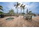 Relaxing hot tub area with seating and patio tables at 17094 Acapulco Rd # 313, Punta Gorda, FL 33955