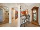 Kitchen with granite counters, wood cabinets, and breakfast bar at 17094 Acapulco Rd # 313, Punta Gorda, FL 33955