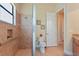 Bathroom features a walk-in shower and toilet at 17199 Anthem Ln, Punta Gorda, FL 33955