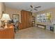 Bedroom with built-in murphy bed, desk, and ample storage at 18646 Kerrville Cir, Port Charlotte, FL 33948