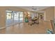 Dining area with sliding glass doors to the patio and pool area at 18646 Kerrville Cir, Port Charlotte, FL 33948