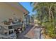 Landscaped patio with various plants and decorations at 18646 Kerrville Cir, Port Charlotte, FL 33948