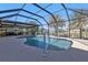 Relaxing pool and lanai with water view at 18646 Kerrville Cir, Port Charlotte, FL 33948