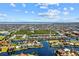 Aerial view of waterfront community with tennis courts and pool at 2002 Bal Harbor Blvd # 1822, Punta Gorda, FL 33950