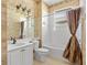 Bathroom with shower/tub combo and white vanity at 2002 Bal Harbor Blvd # 1822, Punta Gorda, FL 33950