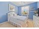 Bedroom with light blue walls and window at 2002 Bal Harbor Blvd # 1822, Punta Gorda, FL 33950