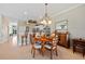 Bright dining area with table and chairs, adjacent to kitchen at 2002 Bal Harbor Blvd # 1822, Punta Gorda, FL 33950