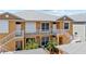 Two-story condo building with stairs and balconies at 2002 Bal Harbor Blvd # 1822, Punta Gorda, FL 33950