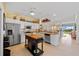 Spacious kitchen with stainless steel appliances and an island at 2002 Bal Harbor Blvd # 1822, Punta Gorda, FL 33950
