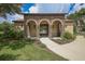 Elegant community clubhouse featuring arched entryways at 2108 La Palma Ave, Port Charlotte, FL 33953