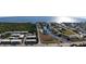 Aerial view showing building and canal views at 22278 Vick St # A100, Punta Gorda, FL 33980
