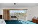 Bedroom with sliding doors leading to a private balcony at 22278 Vick St # A100, Punta Gorda, FL 33980
