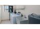 Practical laundry room with washer, dryer, and utility sink at 22278 Vick St # A100, Punta Gorda, FL 33980
