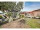 Landscaped backyard with gazebo and patio seating at 22481 Vale Ave, Punta Gorda, FL 33980