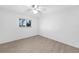 Spacious bedroom with wood-look floors and window at 22481 Vale Ave, Punta Gorda, FL 33980