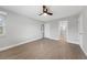 Bright bedroom with wood-look floors and ceiling fan at 22481 Vale Ave, Punta Gorda, FL 33980