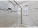 Clean shower with tiled walls and glass door at 22481 Vale Ave, Punta Gorda, FL 33980