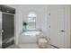 Bathroom with a soaking tub and a walk-in shower at 23176 Lindale Ave, Port Charlotte, FL 33954