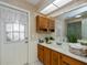 Bathroom with vanity, sink and shower at 23176 Lindale Ave, Port Charlotte, FL 33954