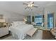 Spacious Primary bedroom with king-size bed and access to backyard at 23176 Lindale Ave, Port Charlotte, FL 33954