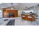Open kitchen with granite countertops and island seating at 23176 Lindale Ave, Port Charlotte, FL 33954