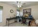 Home office with corner desk and computer setup at 23176 Lindale Ave, Port Charlotte, FL 33954