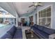 Covered patio with seating and pool view at 23176 Lindale Ave, Port Charlotte, FL 33954