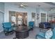 Outdoor patio with seating and view of dining area at 23176 Lindale Ave, Port Charlotte, FL 33954