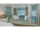 Cozy window seat with built-in bench and view of pool at 23176 Lindale Ave, Port Charlotte, FL 33954